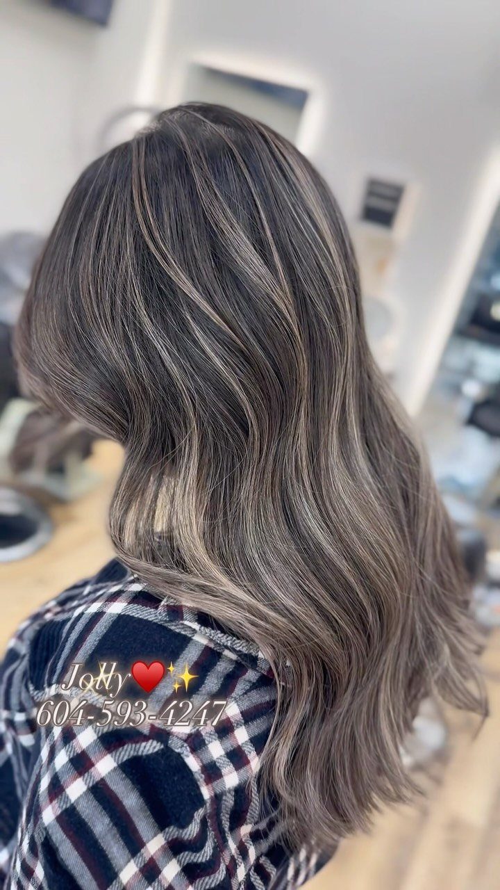 Long smoky ash blonde hair with cool gray and silver strands