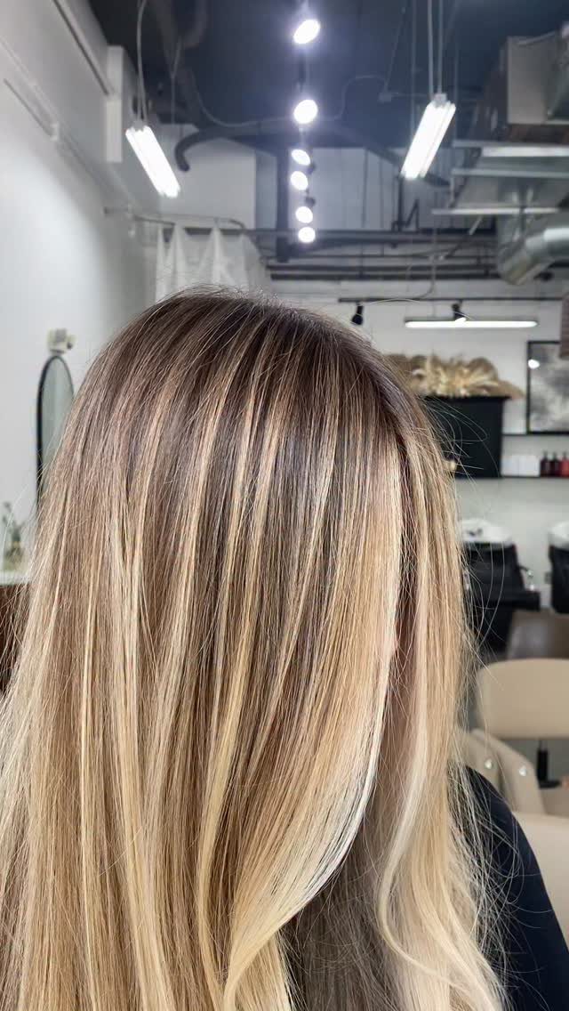 Long blonde hair showing fine dishwater blonde highlights in a salon