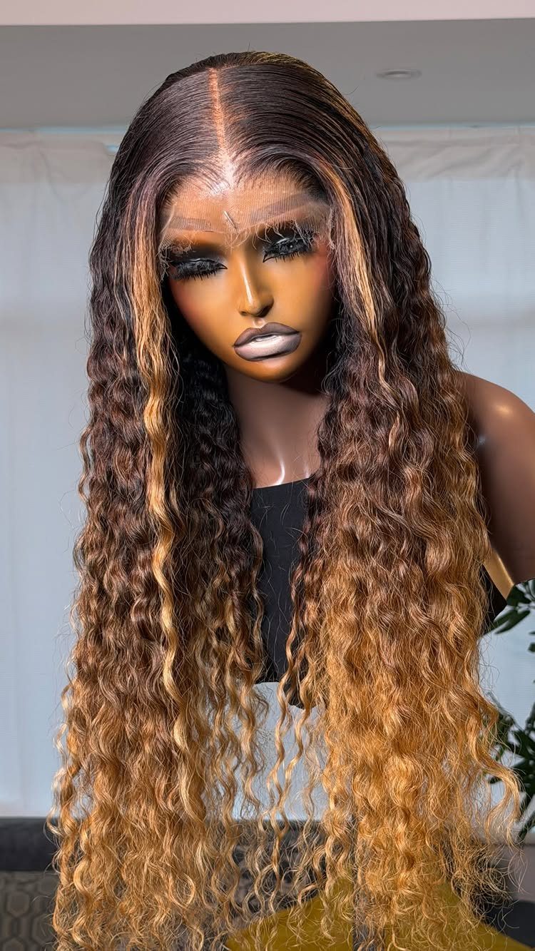 Mannequin with long wavy dark-to-honey-blonde ombre hair